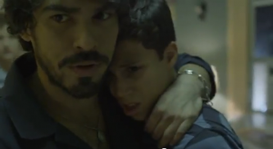 The Call: Father and Son The family's father comforts his son, who has just learned of his mother's legal immigration status.
